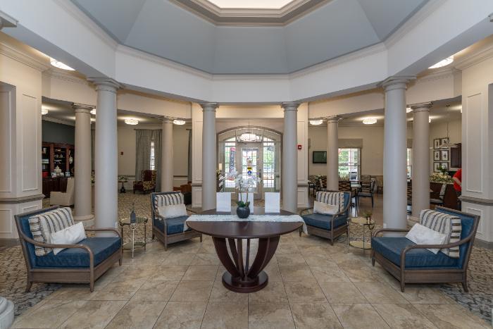 Interior view of a bright common area with seating