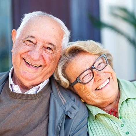 Smiling elderly couple enjoying each other's company