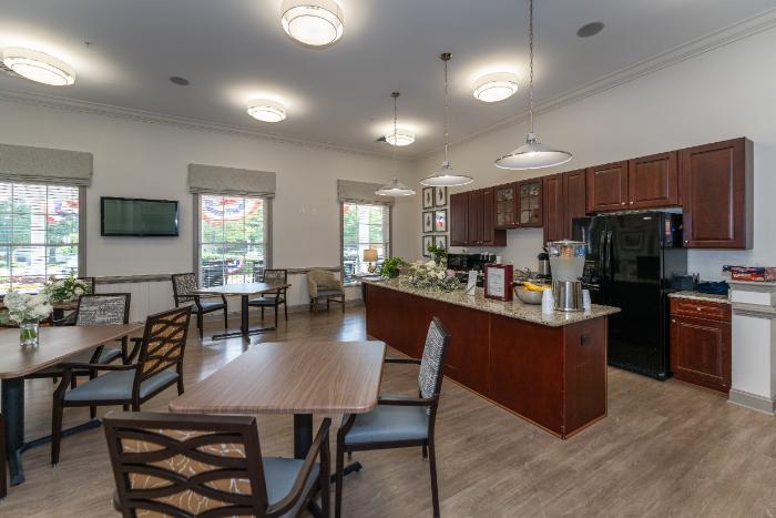 Bright dining area with seating and kitchen counter