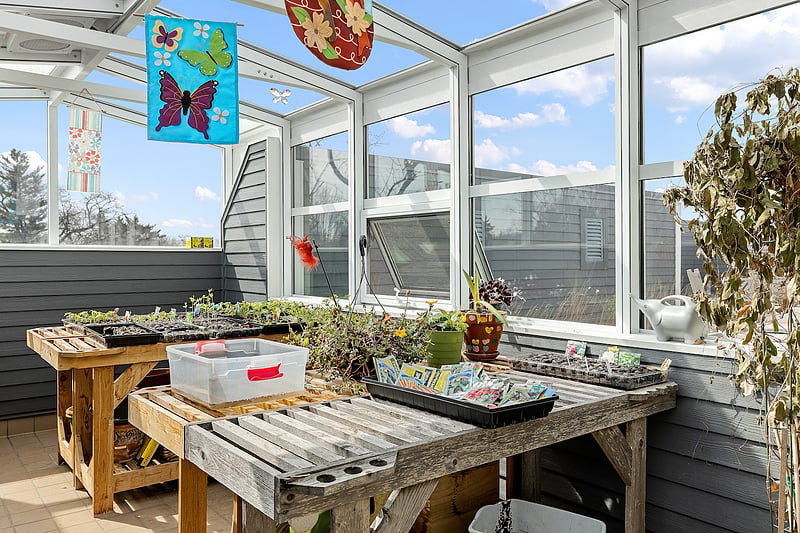 Bright indoor gardening area with plants and decorations