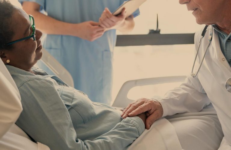 Doctor consulting with a resident in a medical setting