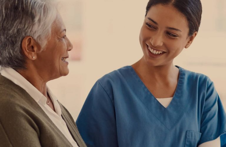 Caregiver interacting with a senior resident