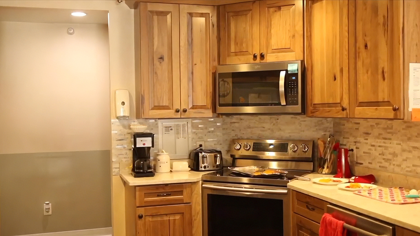 Kitchen area in a senior living facility with appliances