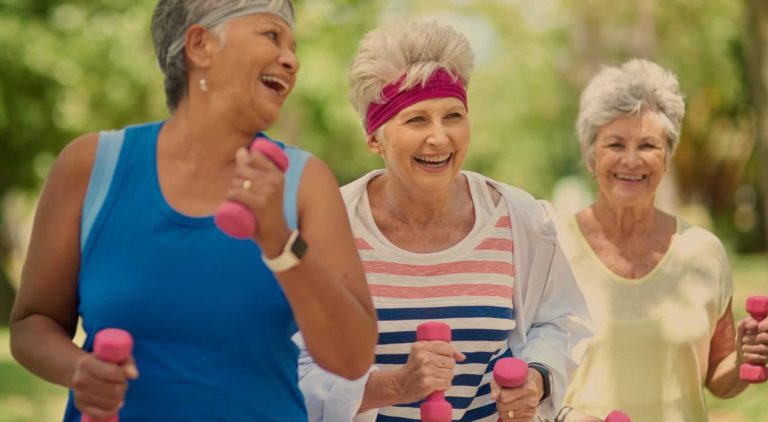 Senior women enjoying a fun outdoor exercise session