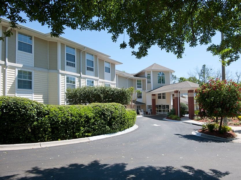 Exterior view of the facility with landscaped entrance