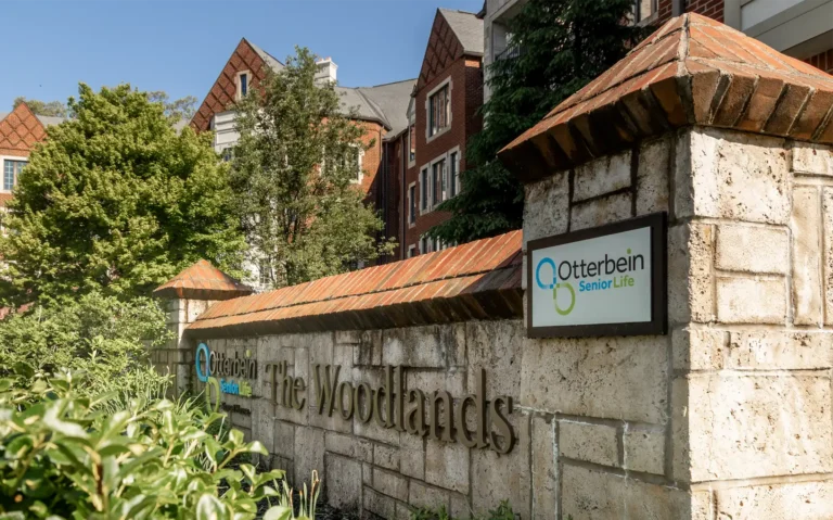 Exterior view of Otterbein facility signage and landscaping