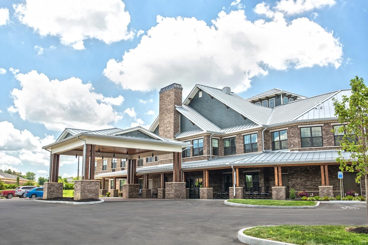 Exterior view of the assisted living facility with a covered entrance