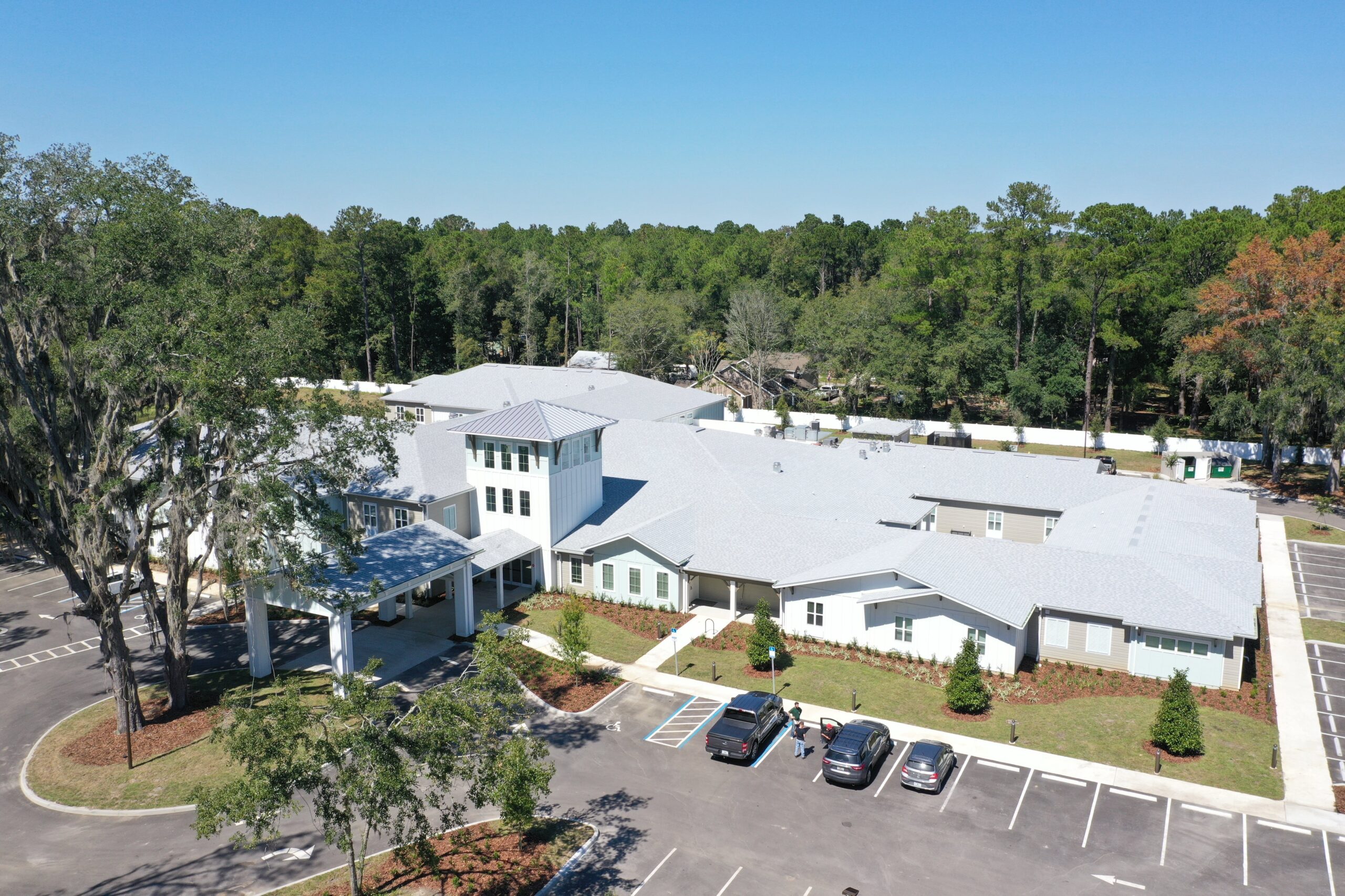Aerial view of the senior living facility with parking