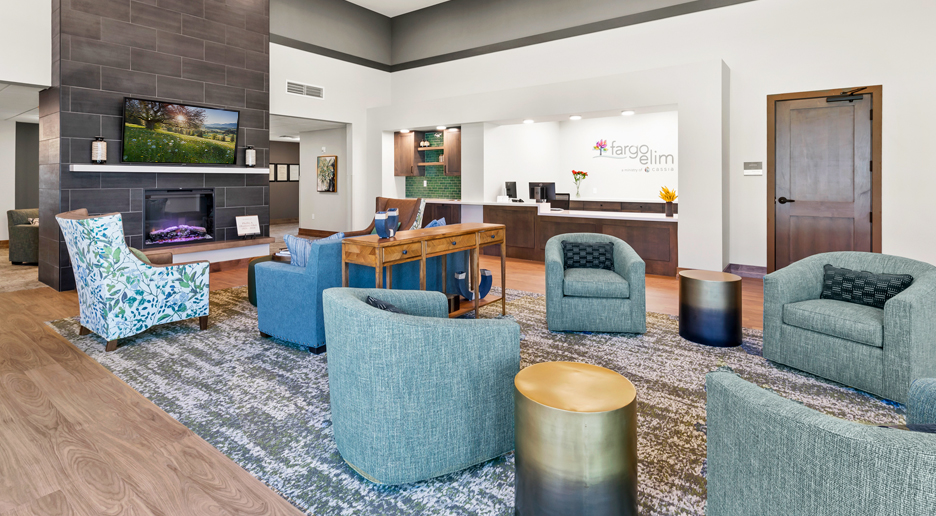 Bright interior lounge with modern furniture and fireplace