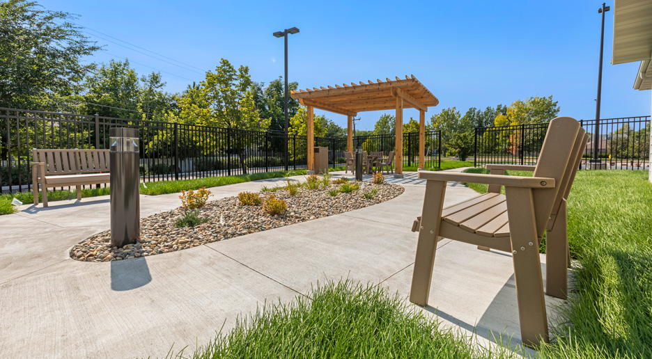 Outdoor seating area with landscaped garden