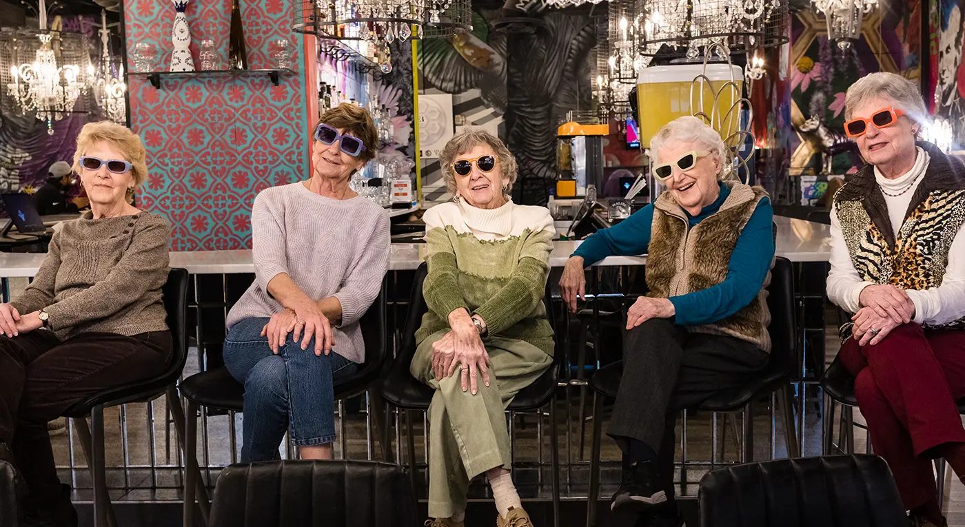 Residents enjoying time in a vibrant common area
