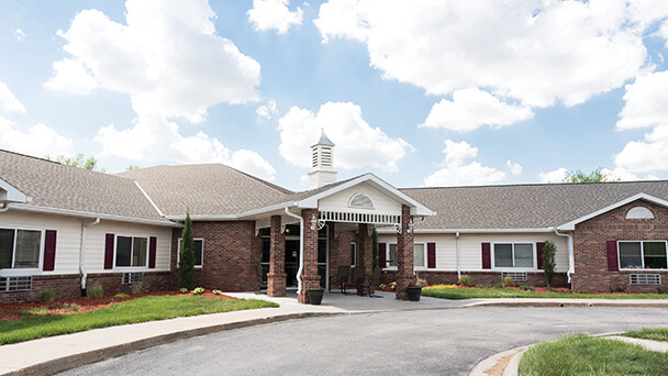 Exterior view of the facility building on a sunny day