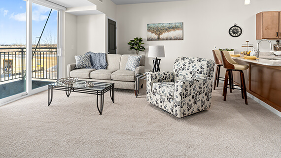 Bright, modern living room interior with furniture
