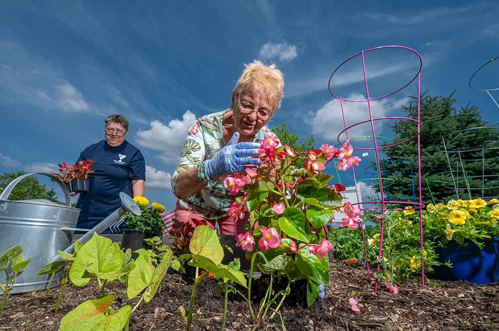 Residents gardening and enjoying outdoor activities