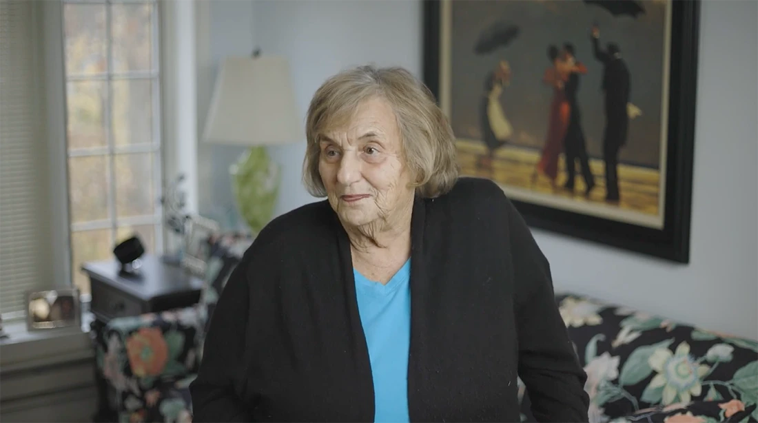 Resident enjoying conversation in a cozy living area
