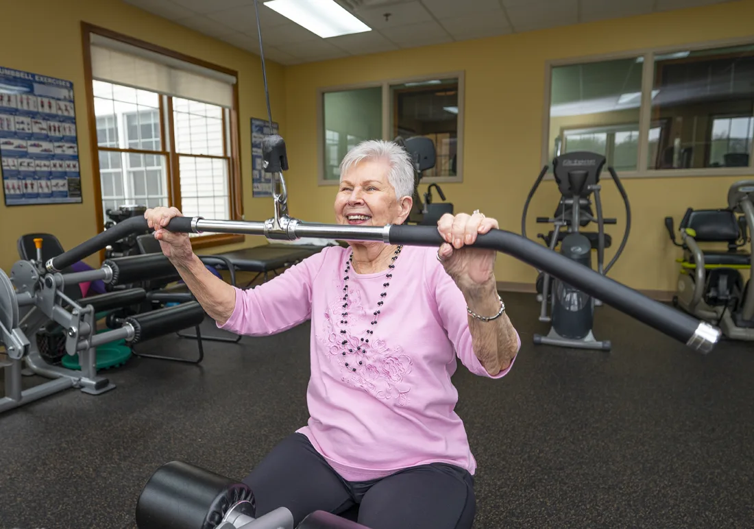 Senior woman exercising in a fitness area