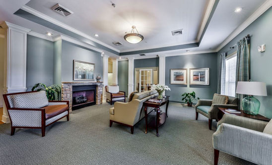 Bright common area with seating and decor