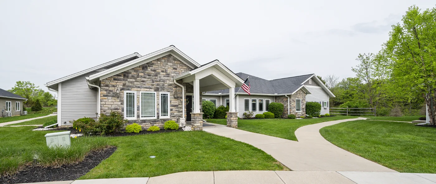 Exterior view of Otterbein Sunset House with landscaped pathways