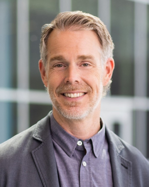 Portrait of a smiling man in a professional setting