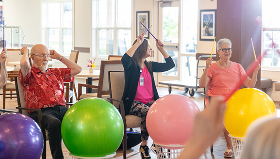 Residents participating in a vibrant activity class
