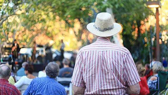 Residents enjoying an outdoor music event