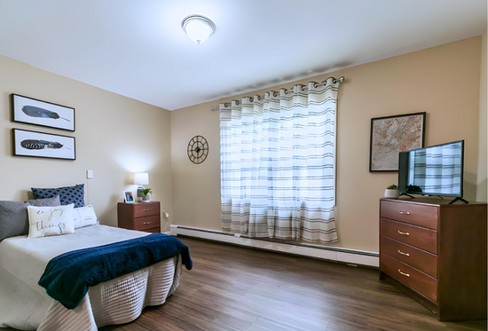 Cozy resident room with natural light and decor