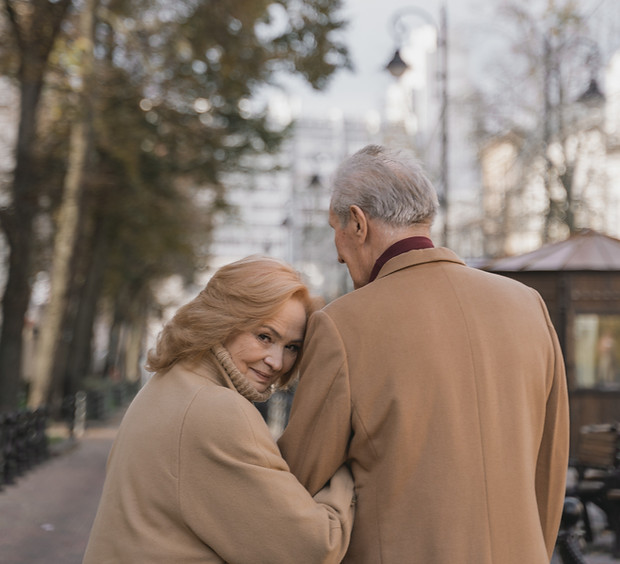 Couple walking in a park, enjoying their time together