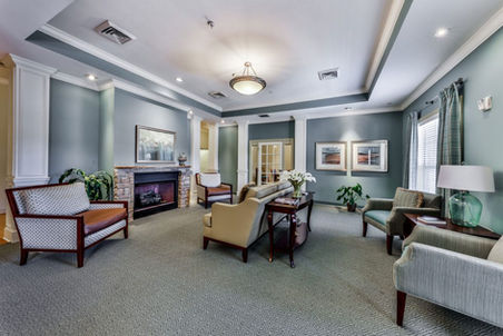 Interior common area with seating and fireplace