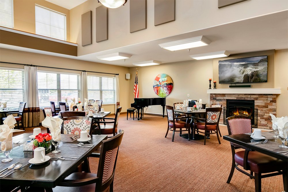 Dining area with tables set for a meal