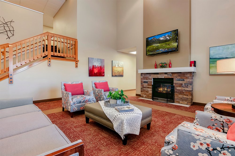 Cozy common area with seating and fireplace