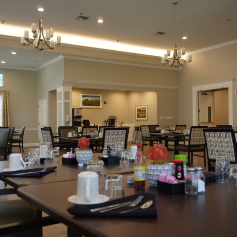 Dining room with set tables and decor