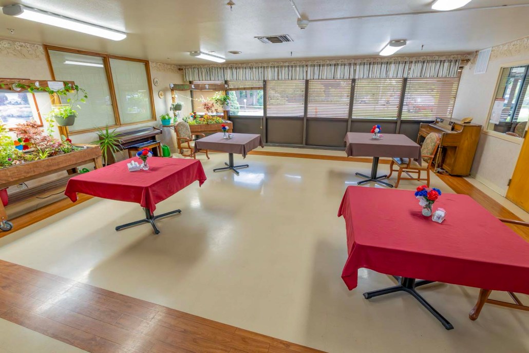 Common area with tables and decorations.