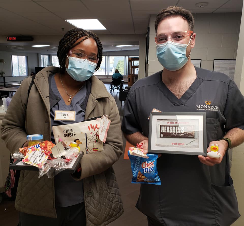 Staff celebrating with snacks and gifts