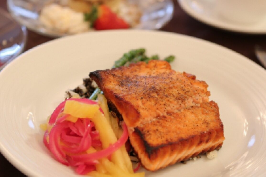 Plate of salmon with vegetables
