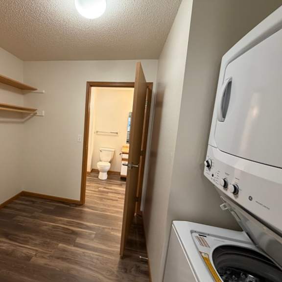Interior view of laundry area and bathroom