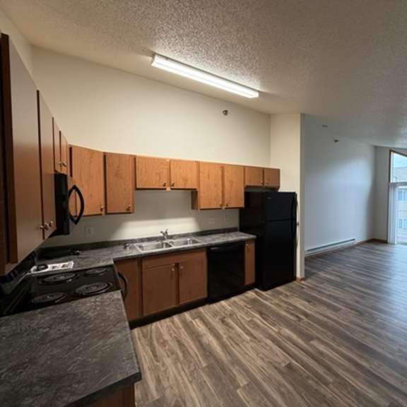 Clean kitchen area in a resident's unit
