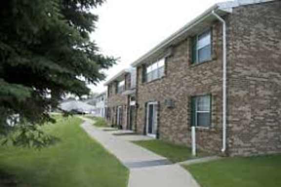 Exterior view of residential buildings with walkways.