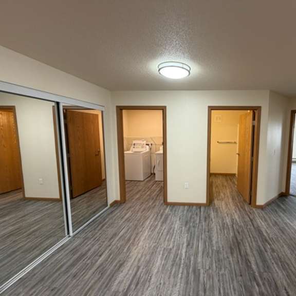 Bright interior room with laundry area