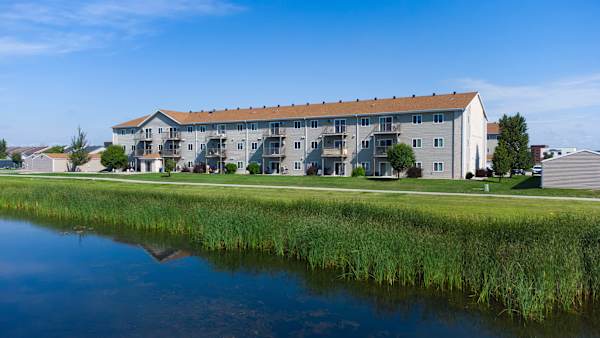 Exterior view of the facility by the water