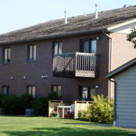 Exterior of a nursing home building with balcony
