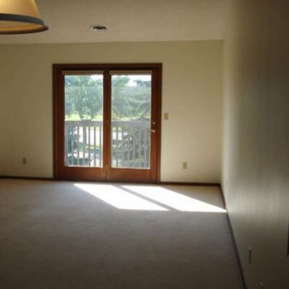 Empty room with a view and sliding doors
