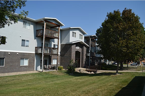 Exterior view of a senior living facility building.