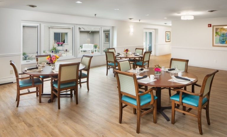 Dining area with tables and flowers