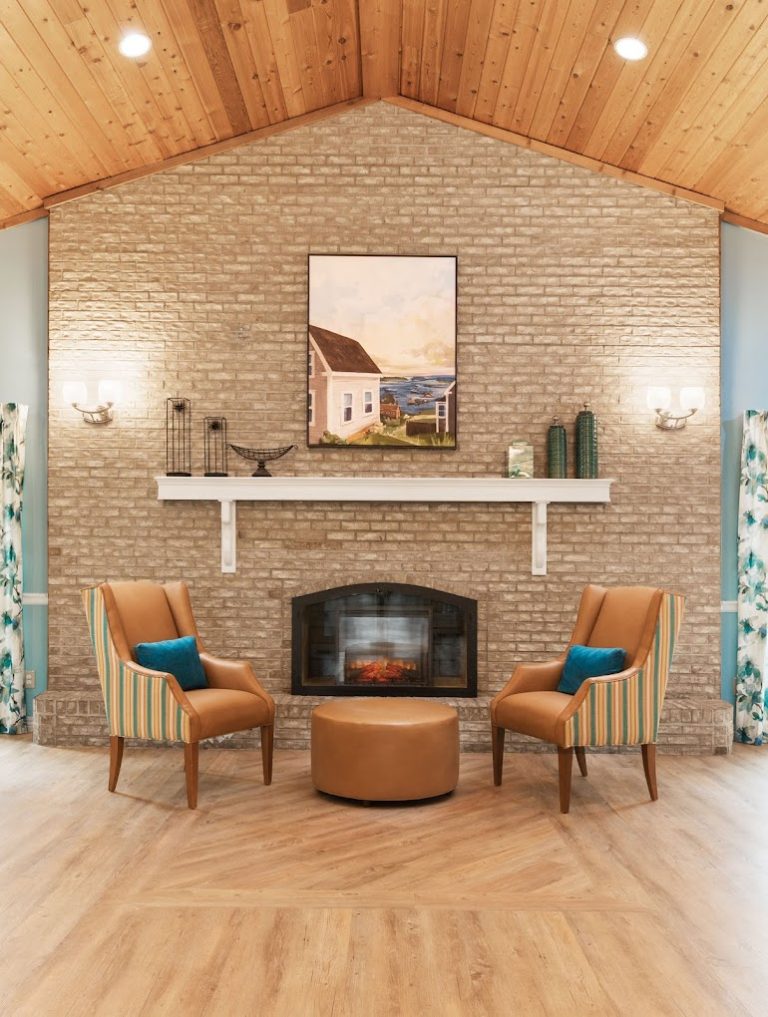 Cozy common area with chairs and artwork