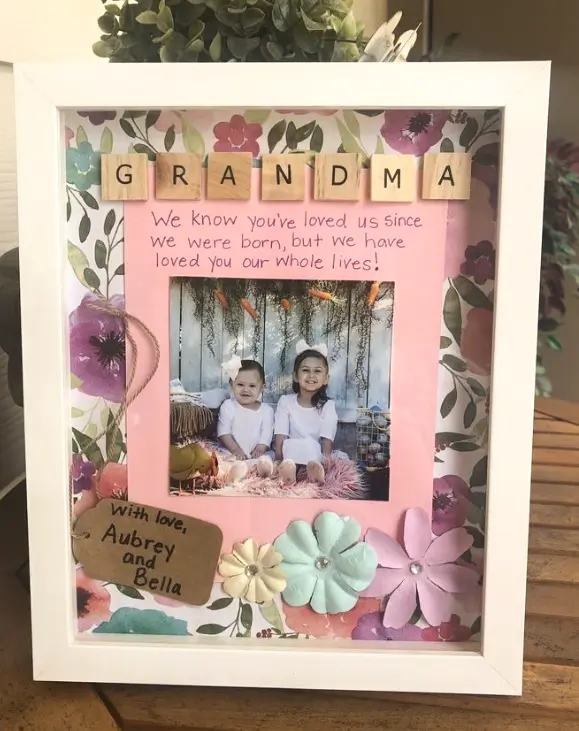 Crafted photo frame with children and heartfelt message.