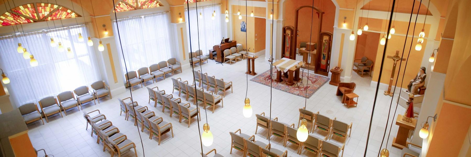 Interior common area with seating and a piano.