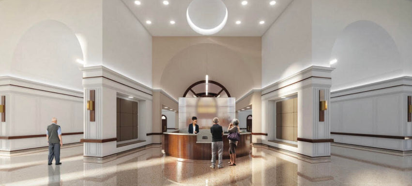 Reception area with staff and visitors