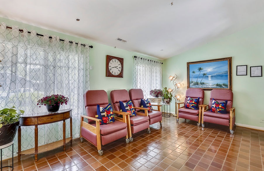 Bright common area with seating and artwork