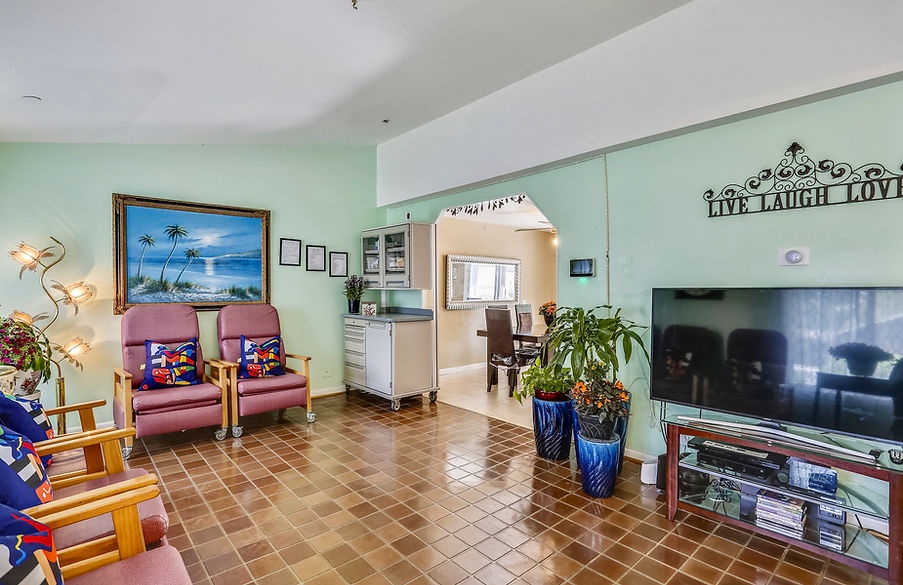 Bright common area with seating and decor
