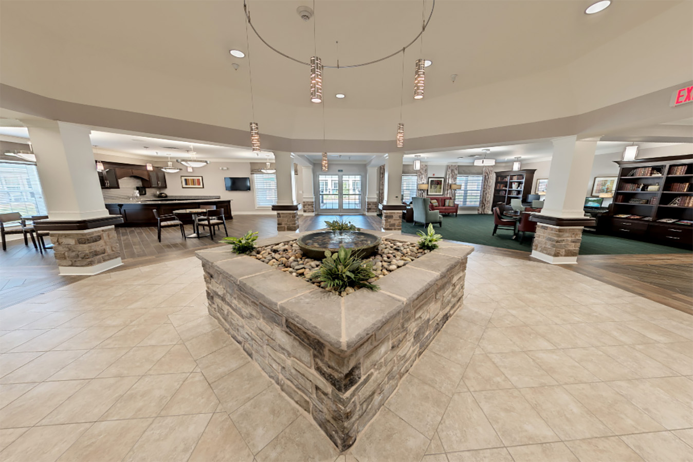Interior lobby with a fountain and seating areas